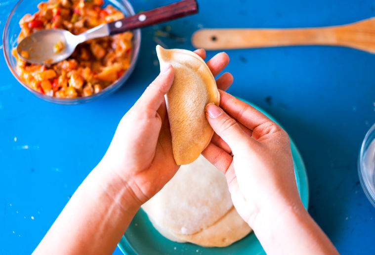 De onde surgiu a empanada?